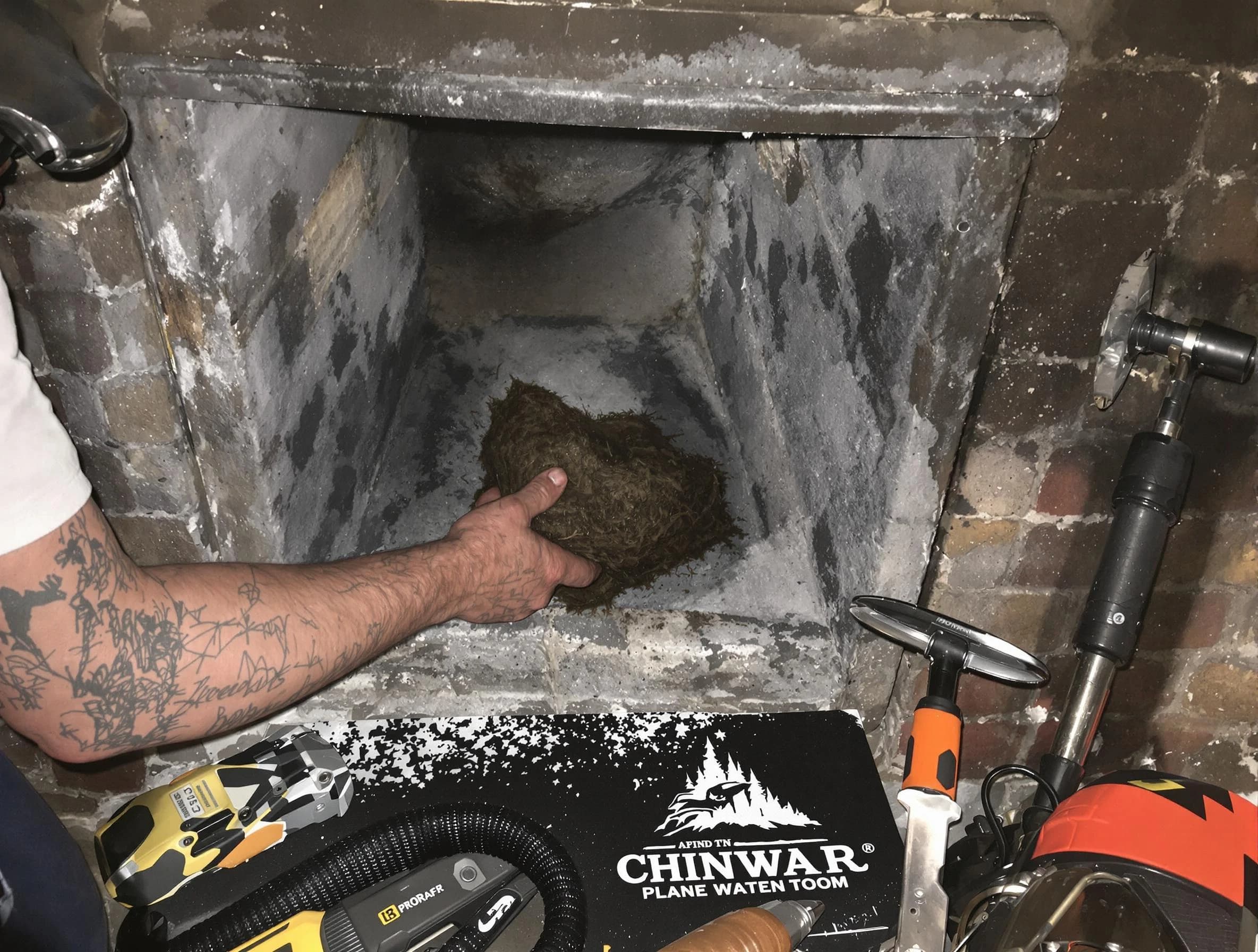 Wayne Chimney Sweep safely removing debris and screening chimney in Wayne, NJ